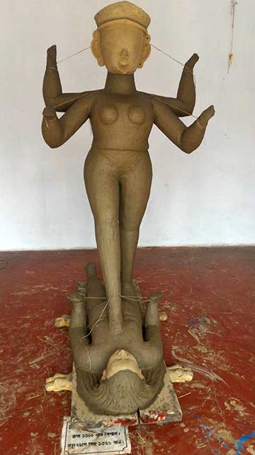 The clay idol being prepared
