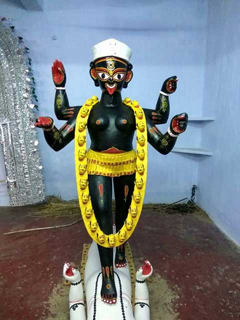 The idol all ready for the finishing touch of hair and dhaker saj