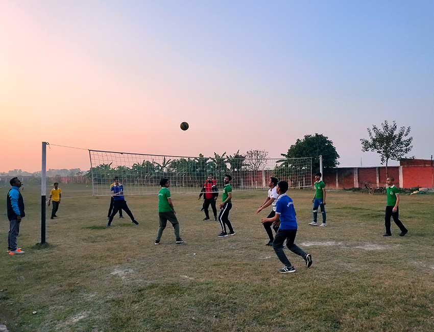 Students of Buddha World School playing volley ball
