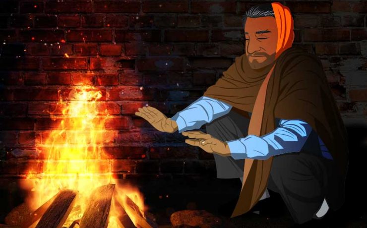The Watchman sitting near a bonfire in winter night