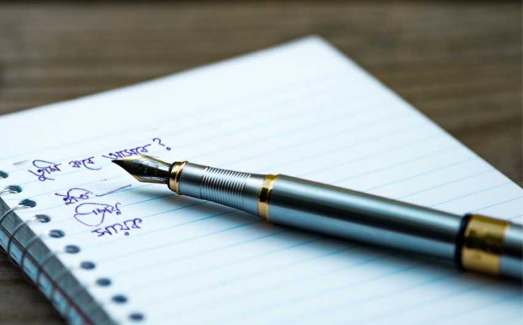 A note book and a pen