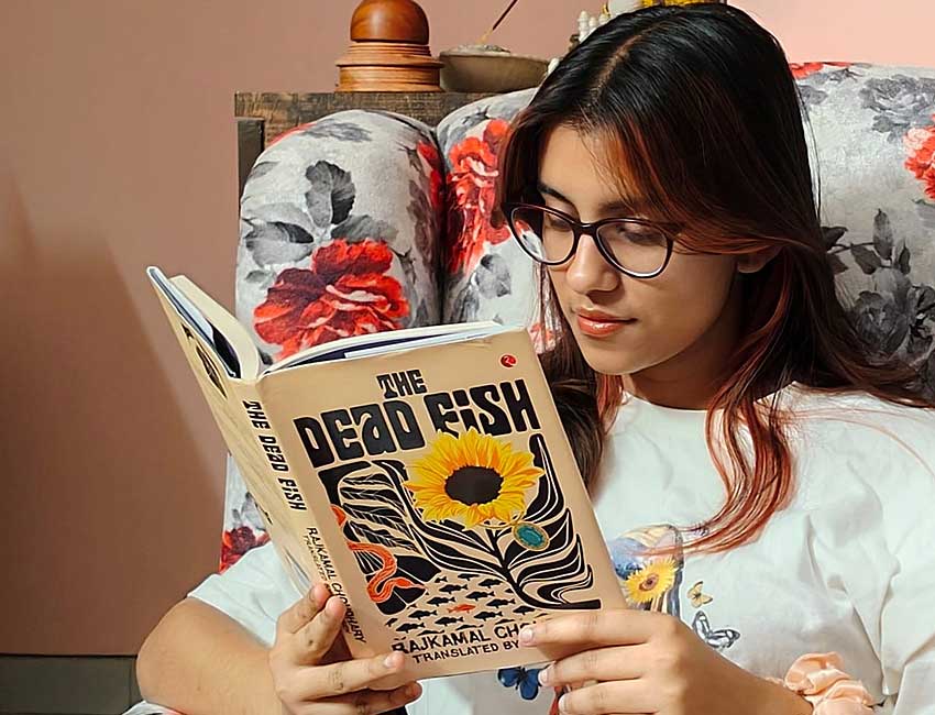 Nabarni reading The Dead Fish